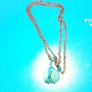 Handmade necklace with turquoise colored stone